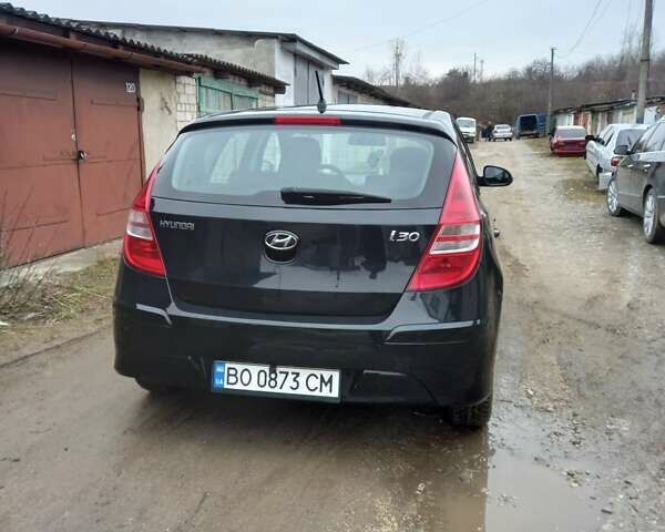 Черный Хендай i30, объемом двигателя 1.6 л и пробегом 354 тыс. км за 6100 $, фото 6 на Automoto.ua