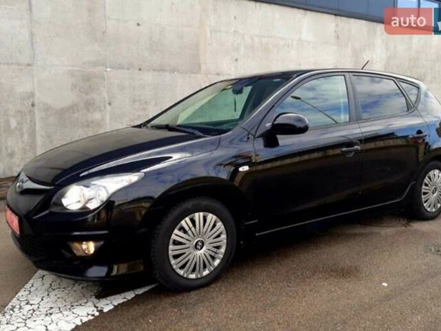 Черный Хендай i30, объемом двигателя 1.4 л и пробегом 240 тыс. км за 6200 $, фото 2 на Automoto.ua