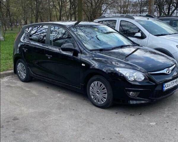 Черный Хендай i30, объемом двигателя 1.4 л и пробегом 240 тыс. км за 6200 $, фото 1 на Automoto.ua