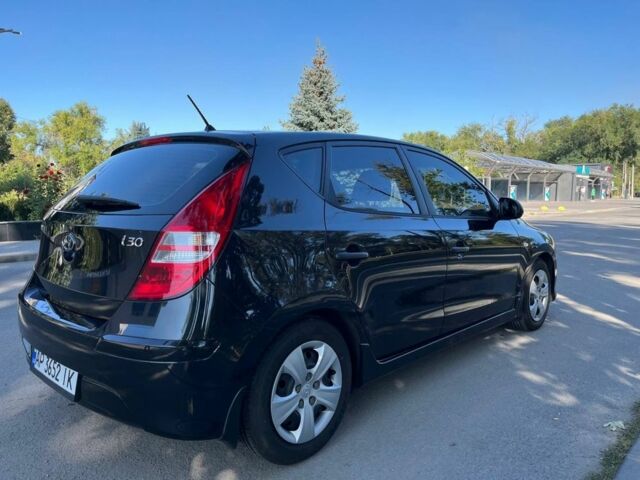 Черный Хендай i30, объемом двигателя 1.4 л и пробегом 230 тыс. км за 6200 $, фото 2 на Automoto.ua
