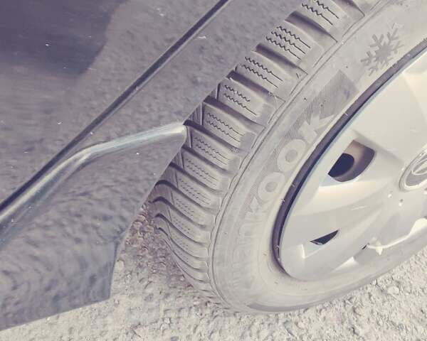 Черный Хендай i30, объемом двигателя 1.4 л и пробегом 210 тыс. км за 5600 $, фото 4 на Automoto.ua