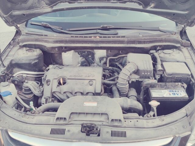 Черный Хендай i30, объемом двигателя 1.4 л и пробегом 210 тыс. км за 5800 $, фото 4 на Automoto.ua