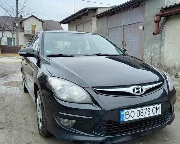 Черный Хендай i30, объемом двигателя 1.6 л и пробегом 354 тыс. км за 6100 $, фото 4 на Automoto.ua