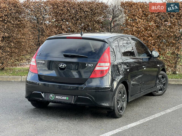 Черный Хендай i30, объемом двигателя 1.6 л и пробегом 180 тыс. км за 6700 $, фото 21 на Automoto.ua