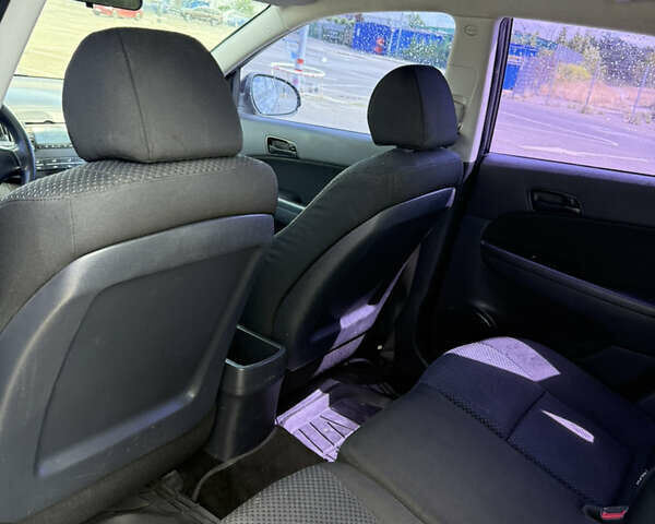 Черный Хендай i30, объемом двигателя 1.58 л и пробегом 230 тыс. км за 6350 $, фото 9 на Automoto.ua