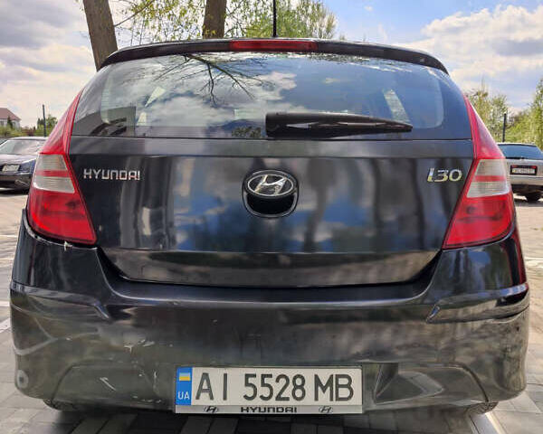 Чорний Хендай i30, об'ємом двигуна 1.4 л та пробігом 126 тис. км за 5200 $, фото 5 на Automoto.ua