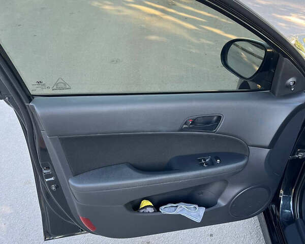 Черный Хендай i30, объемом двигателя 1.4 л и пробегом 230 тыс. км за 6200 $, фото 11 на Automoto.ua