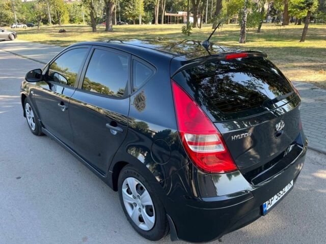Черный Хендай i30, объемом двигателя 1.4 л и пробегом 230 тыс. км за 6200 $, фото 1 на Automoto.ua