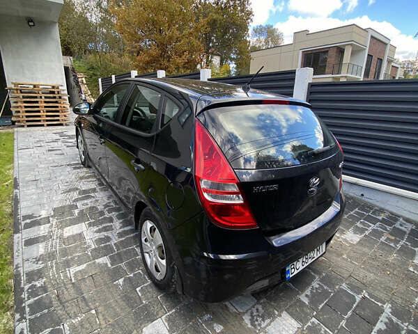 Черный Хендай i30, объемом двигателя 1.4 л и пробегом 175 тыс. км за 5700 $, фото 1 на Automoto.ua