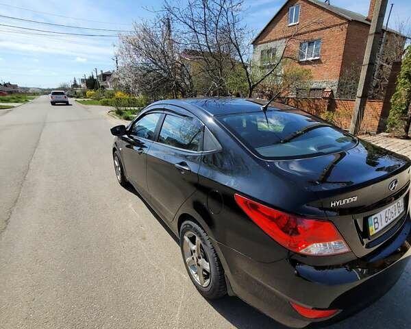 Черный Хендай i30, объемом двигателя 1.4 л и пробегом 119 тыс. км за 7600 $, фото 2 на Automoto.ua