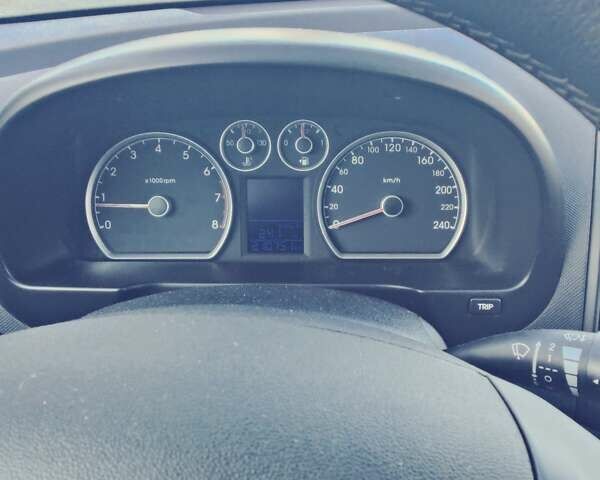 Черный Хендай i30, объемом двигателя 1.4 л и пробегом 210 тыс. км за 5600 $, фото 6 на Automoto.ua