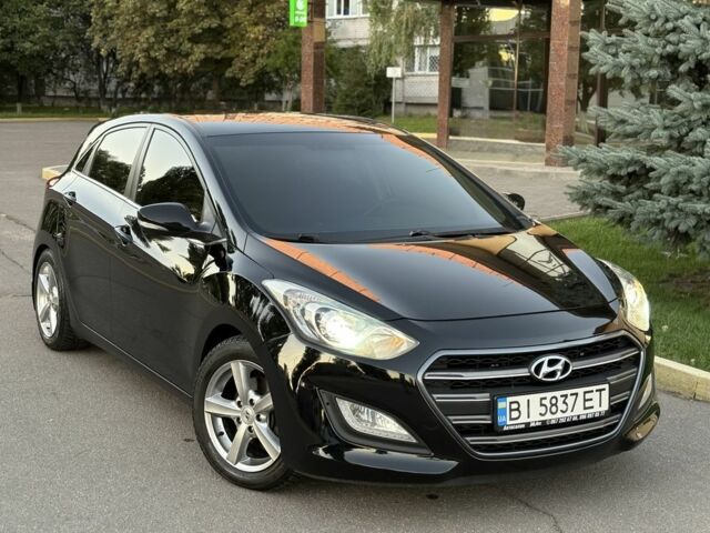 Чорний Хендай i30, об'ємом двигуна 1.6 л та пробігом 160 тис. км за 9777 $, фото 1 на Automoto.ua