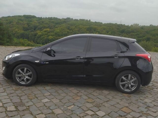 Чорний Хендай i30, об'ємом двигуна 1.6 л та пробігом 227 тис. км за 7500 $, фото 7 на Automoto.ua