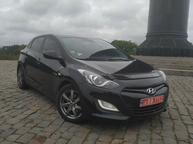 Чорний Хендай i30, об'ємом двигуна 1.6 л та пробігом 227 тис. км за 7500 $, фото 2 на Automoto.ua