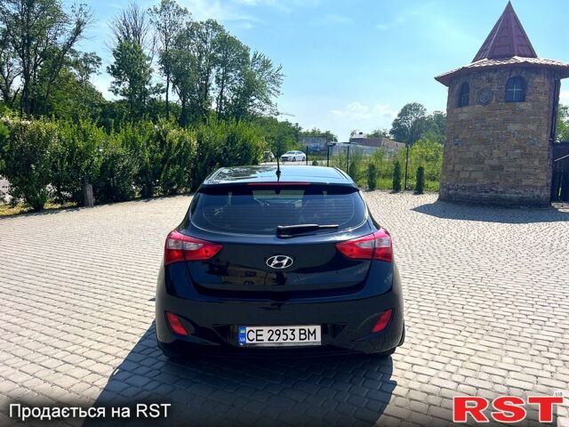 Чорний Хендай i30, об'ємом двигуна 1.4 л та пробігом 164 тис. км за 5999 $, фото 4 на Automoto.ua
