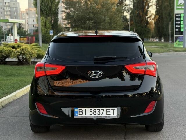 Чорний Хендай i30, об'ємом двигуна 1.6 л та пробігом 160 тис. км за 9777 $, фото 8 на Automoto.ua