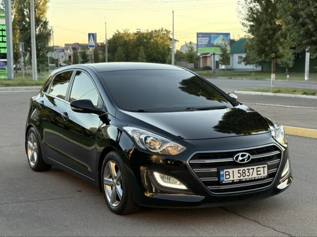 Чорний Хендай i30, об'ємом двигуна 1.6 л та пробігом 160 тис. км за 9777 $, фото 6 на Automoto.ua