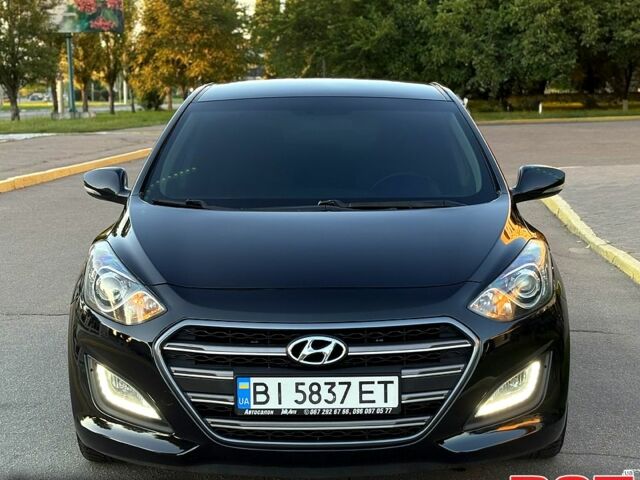 Чорний Хендай i30, об'ємом двигуна 1.6 л та пробігом 160 тис. км за 8699 $, фото 3 на Automoto.ua