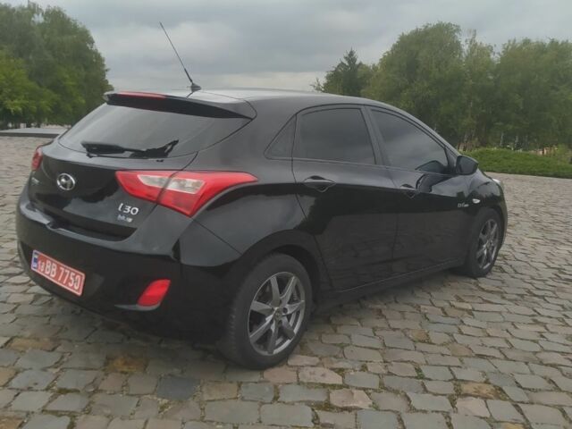 Чорний Хендай i30, об'ємом двигуна 1.6 л та пробігом 227 тис. км за 7500 $, фото 4 на Automoto.ua