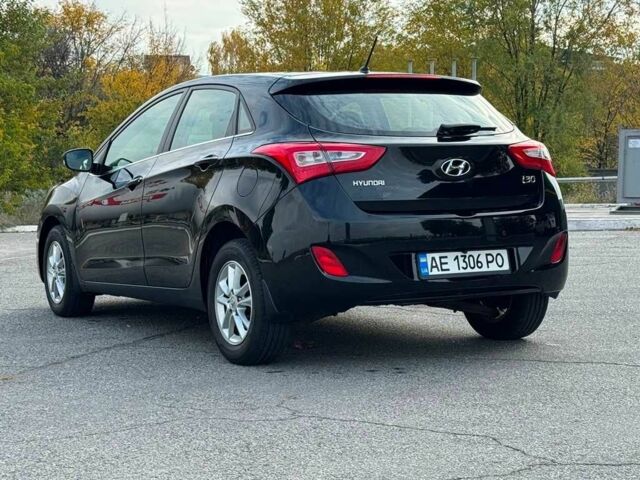 Черный Хендай i30, объемом двигателя 1.6 л и пробегом 105 тыс. км за 8999 $, фото 4 на Automoto.ua