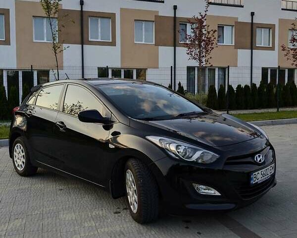 Черный Хендай i30, объемом двигателя 1.4 л и пробегом 138 тыс. км за 8700 $, фото 6 на Automoto.ua