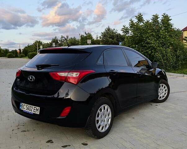 Черный Хендай i30, объемом двигателя 1.4 л и пробегом 138 тыс. км за 8700 $, фото 4 на Automoto.ua