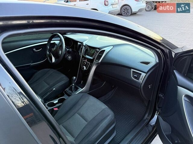 Черный Хендай i30, объемом двигателя 1.4 л и пробегом 155 тыс. км за 8500 $, фото 2 на Automoto.ua