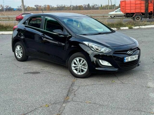 Черный Хендай i30, объемом двигателя 1.6 л и пробегом 105 тыс. км за 8999 $, фото 1 на Automoto.ua