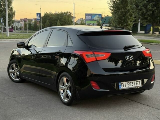 Чорний Хендай i30, об'ємом двигуна 1.6 л та пробігом 160 тис. км за 9777 $, фото 9 на Automoto.ua