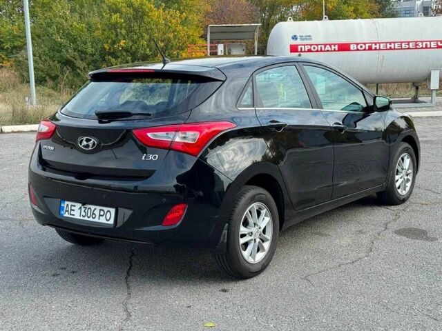 Черный Хендай i30, объемом двигателя 1.6 л и пробегом 105 тыс. км за 8999 $, фото 2 на Automoto.ua