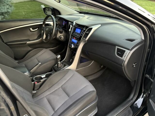 Чорний Хендай i30, об'ємом двигуна 1.6 л та пробігом 160 тис. км за 9777 $, фото 18 на Automoto.ua