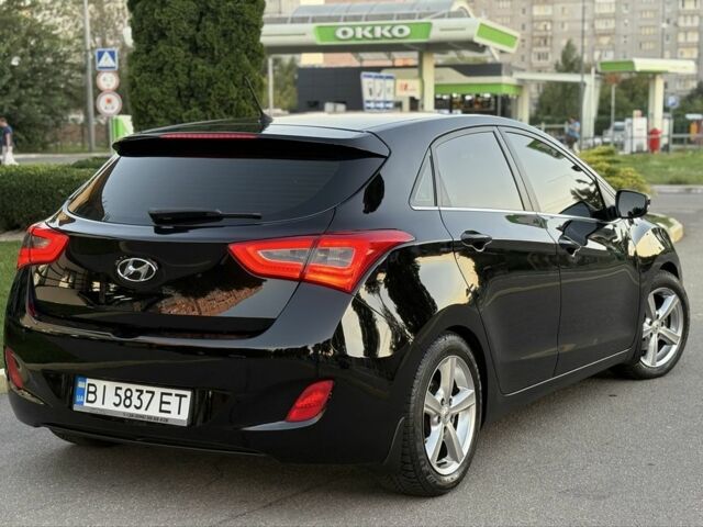 Чорний Хендай i30, об'ємом двигуна 1.6 л та пробігом 160 тис. км за 9777 $, фото 7 на Automoto.ua