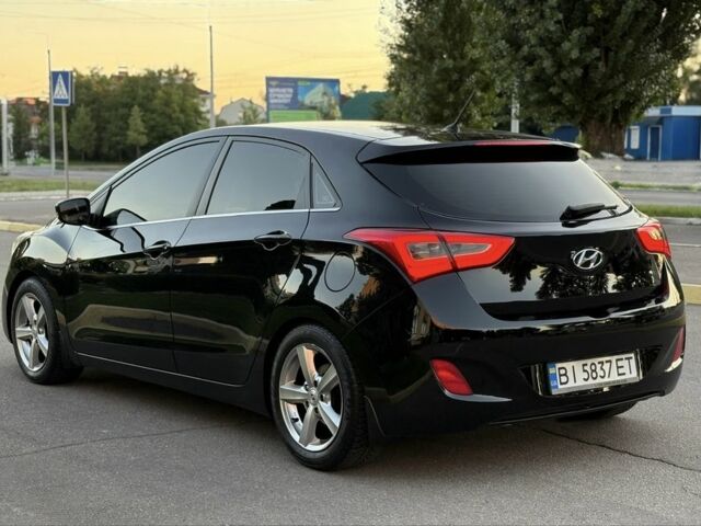 Чорний Хендай i30, об'ємом двигуна 1.6 л та пробігом 160 тис. км за 9777 $, фото 15 на Automoto.ua