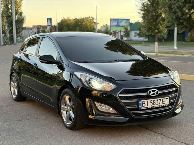 Чорний Хендай i30, об'ємом двигуна 1.6 л та пробігом 160 тис. км за 9777 $, фото 3 на Automoto.ua
