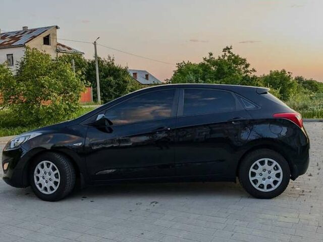 Черный Хендай i30, объемом двигателя 1.4 л и пробегом 138 тыс. км за 8700 $, фото 1 на Automoto.ua