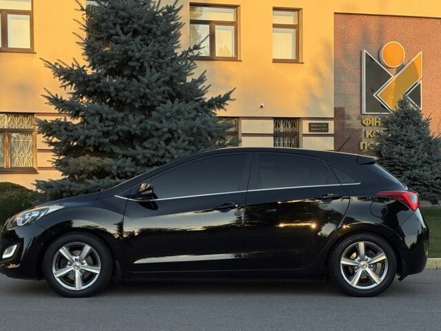 Чорний Хендай i30, об'ємом двигуна 1.6 л та пробігом 160 тис. км за 9777 $, фото 11 на Automoto.ua
