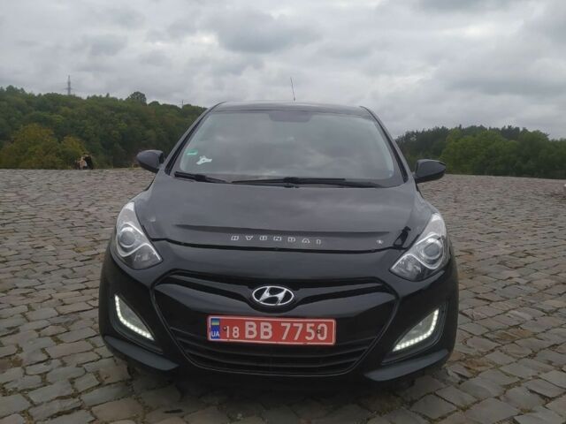 Чорний Хендай i30, об'ємом двигуна 1.6 л та пробігом 227 тис. км за 7500 $, фото 1 на Automoto.ua