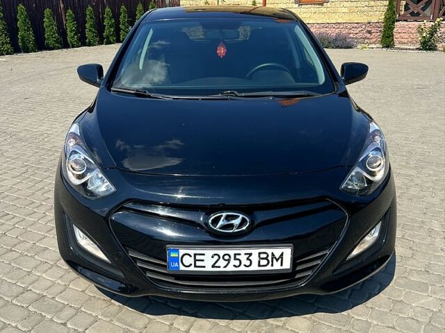 Чорний Хендай i30, об'ємом двигуна 1.4 л та пробігом 164 тис. км за 5999 $, фото 7 на Automoto.ua