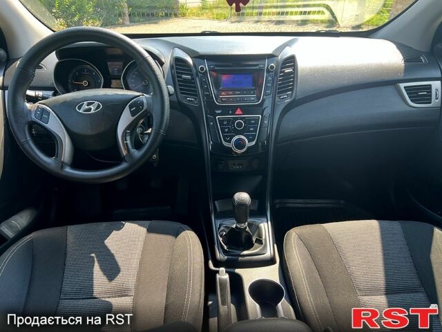 Чорний Хендай i30, об'ємом двигуна 1.4 л та пробігом 164 тис. км за 5999 $, фото 8 на Automoto.ua