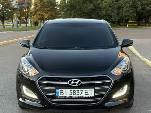 Чорний Хендай i30, об'ємом двигуна 1.6 л та пробігом 160 тис. км за 9777 $, фото 4 на Automoto.ua