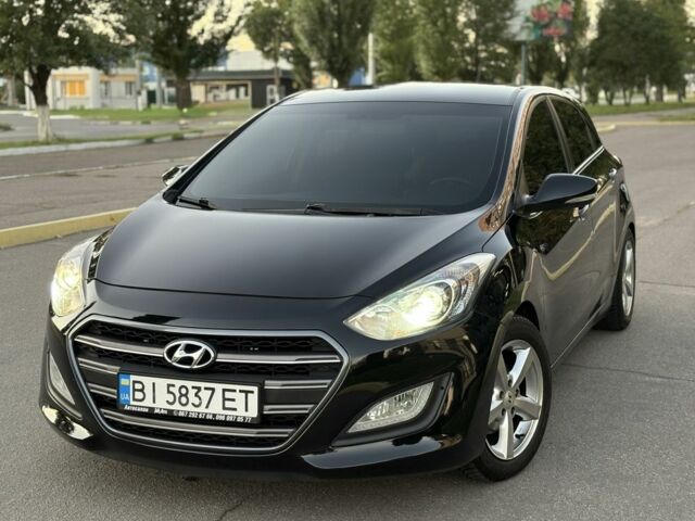 Чорний Хендай i30, об'ємом двигуна 1.6 л та пробігом 160 тис. км за 9777 $, фото 14 на Automoto.ua