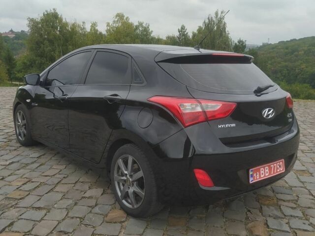 Чорний Хендай i30, об'ємом двигуна 1.6 л та пробігом 227 тис. км за 7500 $, фото 6 на Automoto.ua