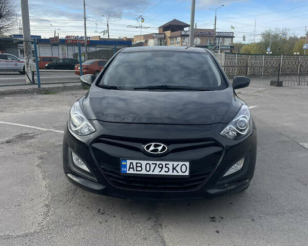 Чорний Хендай i30, об'ємом двигуна 1.4 л та пробігом 190 тис. км за 7000 $, фото 3 на Automoto.ua