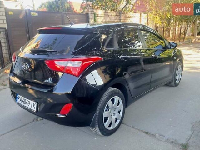 Черный Хендай i30, объемом двигателя 1.59 л и пробегом 102 тыс. км за 6700 $, фото 1 на Automoto.ua