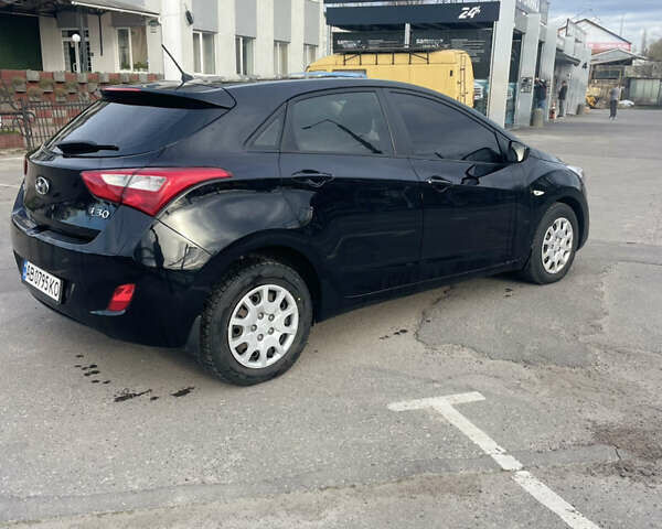 Чорний Хендай i30, об'ємом двигуна 1.4 л та пробігом 190 тис. км за 7000 $, фото 2 на Automoto.ua