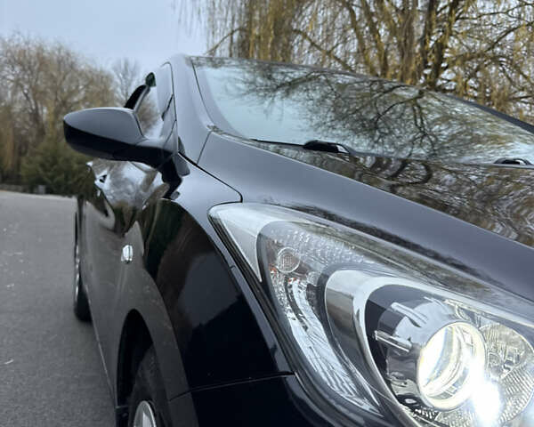 Черный Хендай i30, объемом двигателя 1.4 л и пробегом 200 тыс. км за 8500 $, фото 5 на Automoto.ua