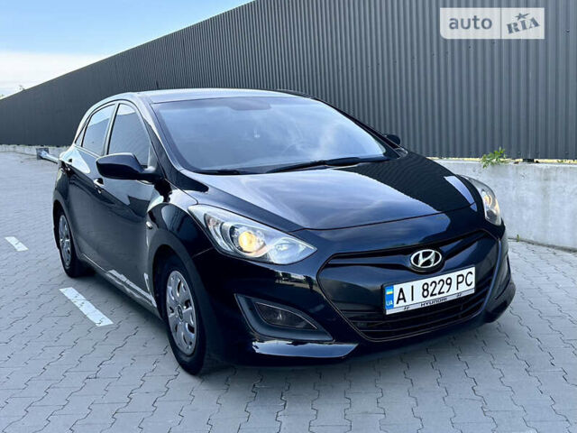 Черный Хендай i30, объемом двигателя 1.4 л и пробегом 212 тыс. км за 8500 $, фото 10 на Automoto.ua