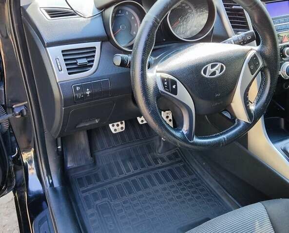 Черный Хендай i30, объемом двигателя 1.59 л и пробегом 190 тыс. км за 7100 $, фото 10 на Automoto.ua