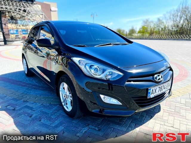 Чорний Хендай i30, об'ємом двигуна 1.4 л та пробігом 70 тис. км за 9500 $, фото 7 на Automoto.ua