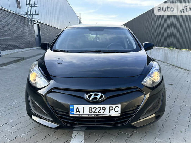 Черный Хендай i30, объемом двигателя 1.4 л и пробегом 212 тыс. км за 8500 $, фото 6 на Automoto.ua